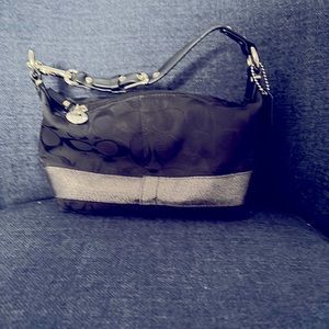 Coach purse in black and silver
